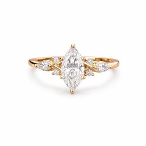 markiz kesim merkez pirlanta tektaşli minimal markiz ve yuvarlak pirlanta detayli vintage yuzuk modeli