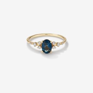 oval kesim london blue topaz merkez tasli ve pirlanta detayli vintage yuzuk modeli